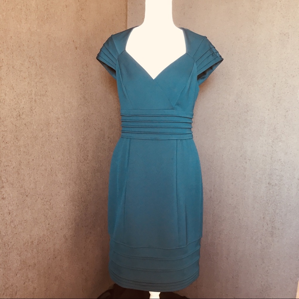 Women’s teal dress, cut-out back